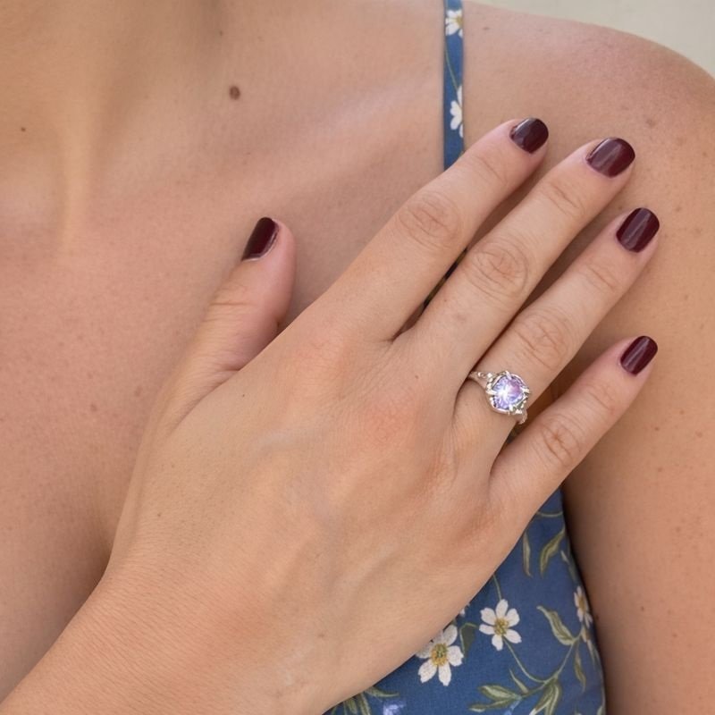 A woman wearing the handcrafted Chevalier Heart Silver Ring by KRINIA, showcasing the bold sculptural heart design in sterling silver 925.